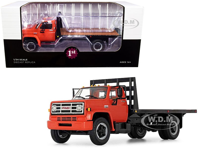 GMC 6500 Flatbed Truck Orange and Black 1/34 Diecast Model by First Gear