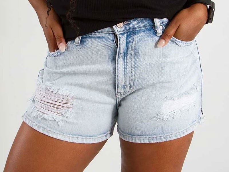 KanCan Jeans High Rise Destructed Denim Shorts For Women in Light Wash