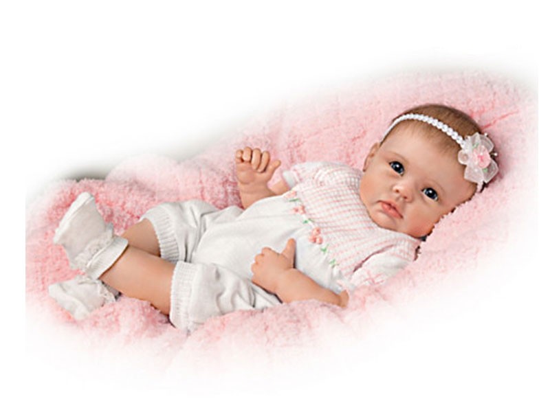 Lifelike Interactive Baby Doll Really Holds Your Hand