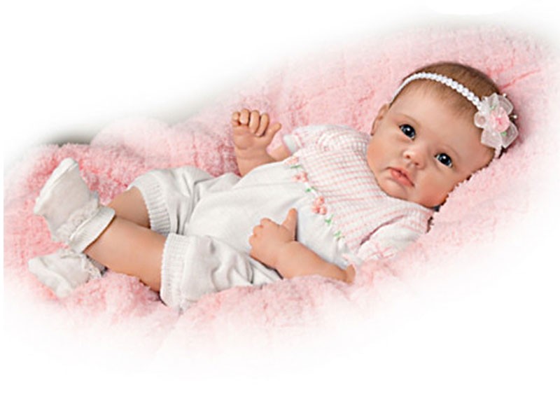 Lifelike Interactive Baby Doll Really Holds Your Hand