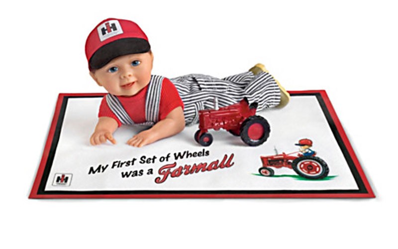 My First Set of Wheels was a Farmall Baby Boy Doll